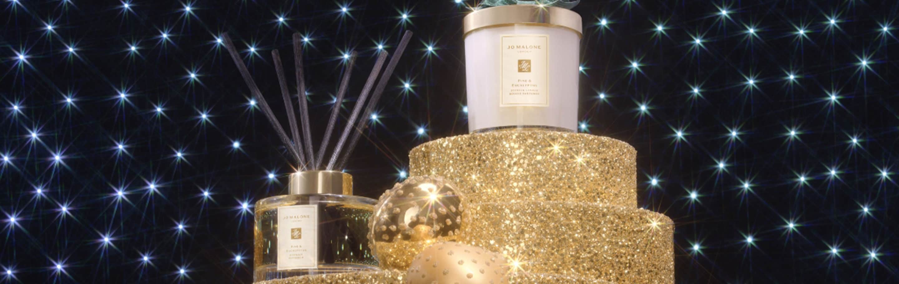 pine & eucalyptus home candle & diffuser, amongst snowballs and on a bed of moss with candy canes